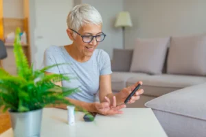 Woman Checking Her Blood Sugar